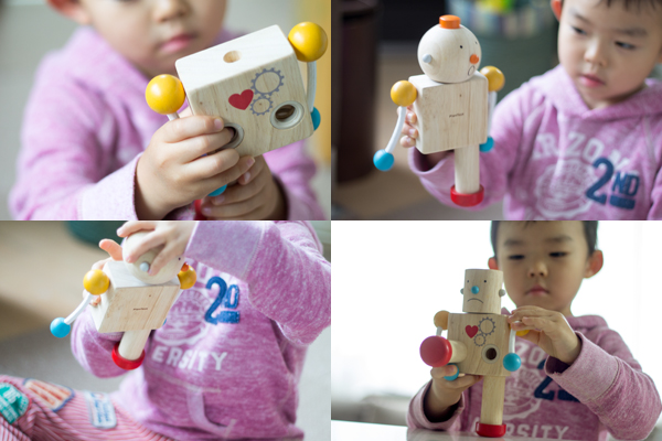 ビルドロボットを組み立てている子供